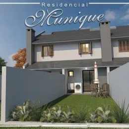Fachada de uma residência em Lajeado, Brasil, com jardim na frente.