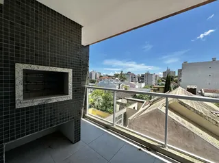 Vista da varanda de um imóvel em Lajeado, Brasil, com vista para outras construções.