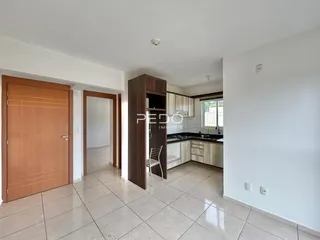 A sala de estar e cozinha de um imóvel em Lajeado, Brasil.