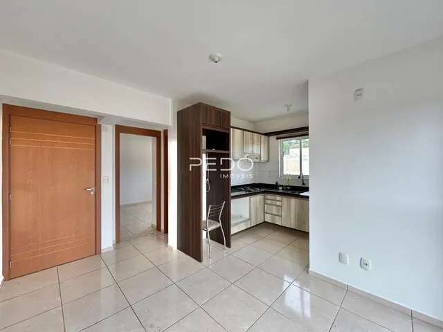 A sala de estar e cozinha de um imóvel em Lajeado, Brasil.