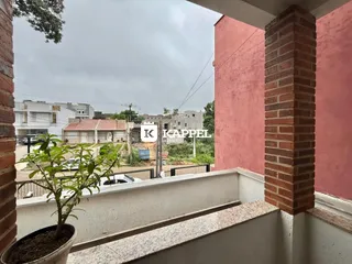 Vista da varanda de um imóvel em Lajeado, mostrando vizinhanças residenciais.