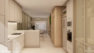 Cozinha moderna com armários claros e ilha central em ambiente interno.