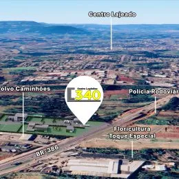 Vista aérea da área rural em Lajeado, mostrando campos e estradas.