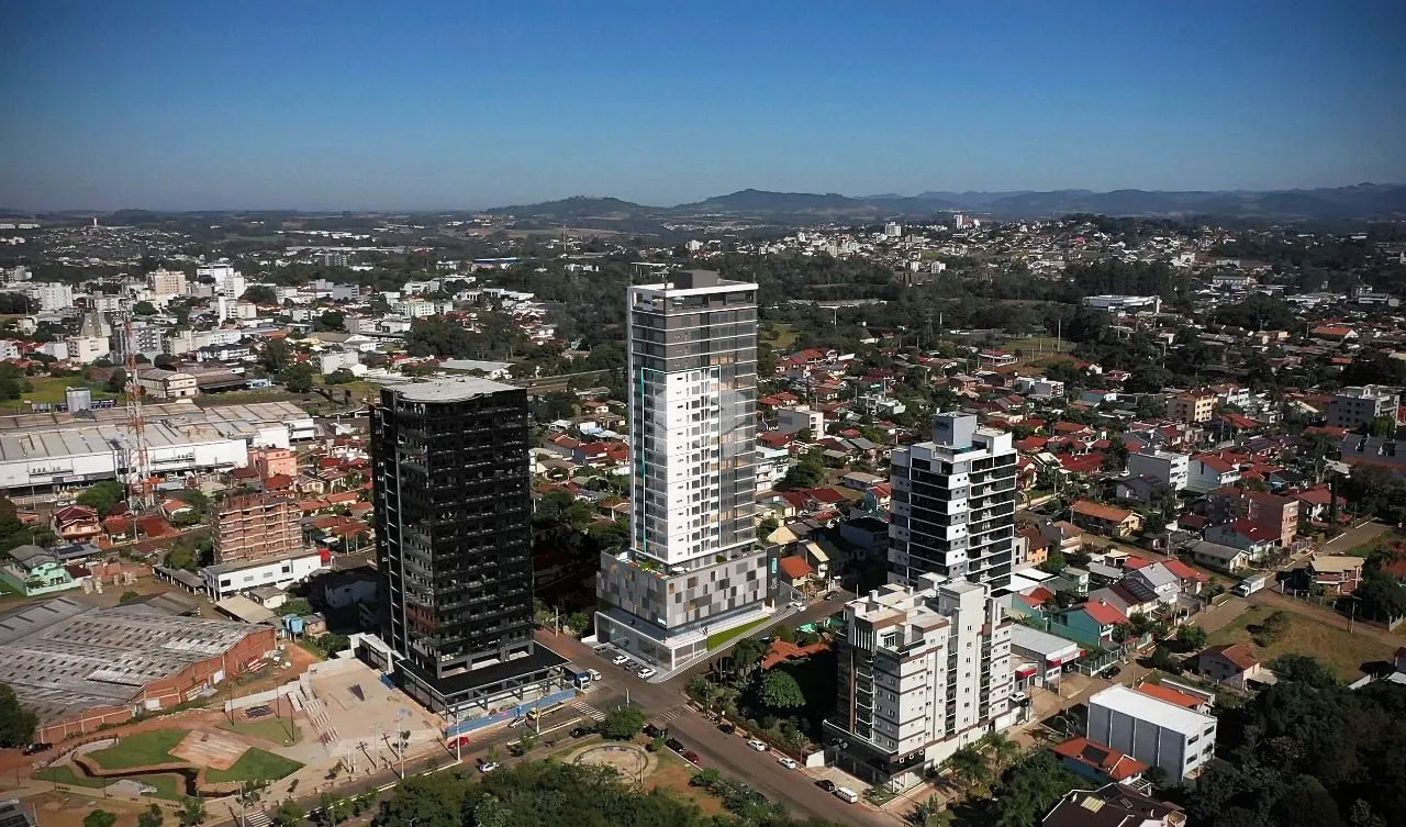 Vista aérea de uma área residencial em Lajeado, Brasil, mostrando o desenvolvimento urbano.