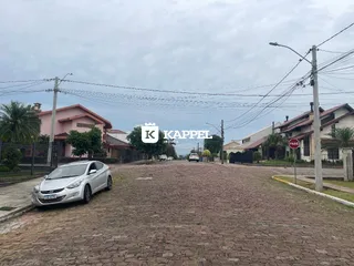 Vista da rua com casas residenciais em Lajeado, Brasil.