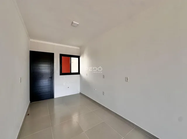 Corredor interno de um imóvel em Lajeado, Brasil.
