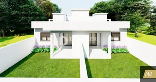 Fachada de uma casa moderna com jardim em Lajeado.