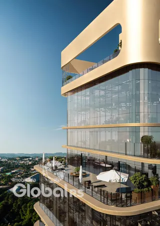Fachada moderna de um edifício residencial em Lajeado com terraço.
