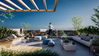 Área externa moderna com mobiliário de lazer e vegetação.