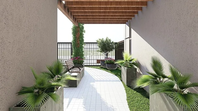 Vista da fachada de uma propriedade com jardim e caminho pavimentado.