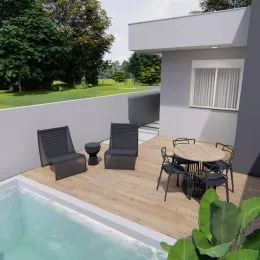 Foto da piscina e deck de madeira de uma propriedade em Lajeado.