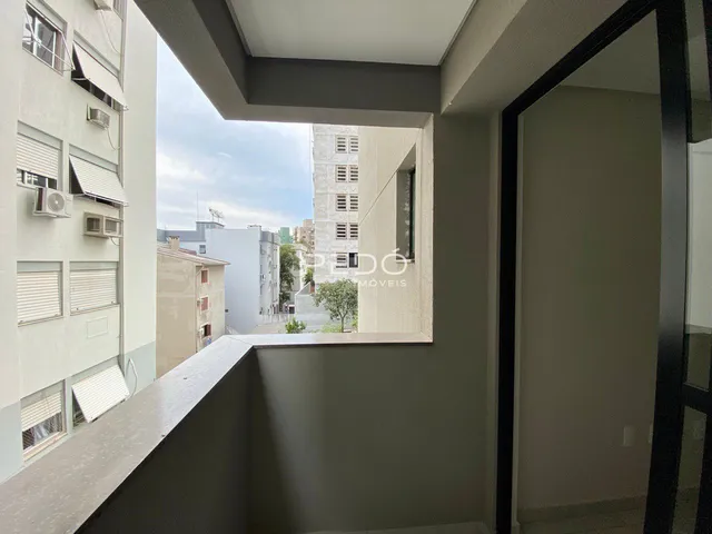 Vista de uma varanda com vista para outros edifícios em Lajeado.