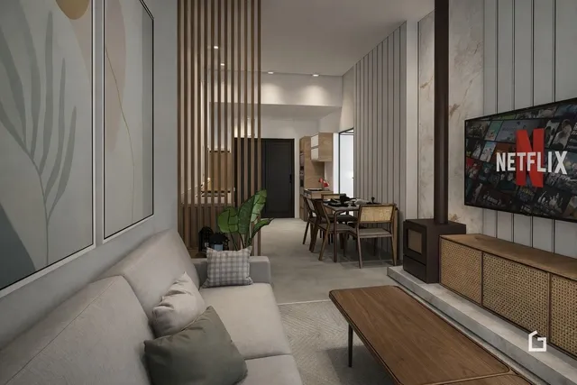 Sala de estar moderna com sofá e decoração em um apartamento.