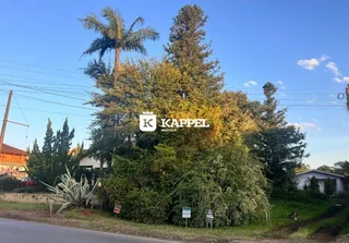 Foto externa mostrando a vegetação e a rua em Lajeado, Brasil.