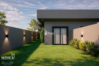 A fachada de uma casa moderna com jardim gramado em Lajeado, Brasil.