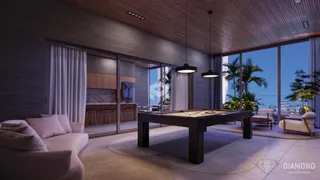 Ambiente moderno com sala de estar e área de jantar em um imóvel.