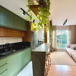 Vista da cozinha e sala de estar de um imóvel em Lajeado, Brasil.