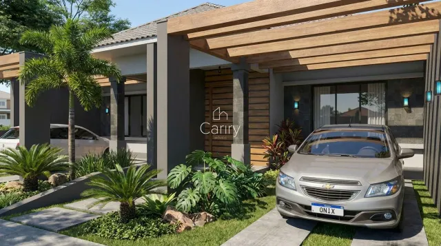 Fachada de uma residência em Lajeado, Brasil, com paisagismo frontal e garagem.