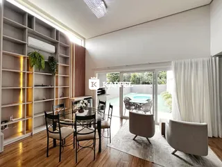 Uma sala de jantar com piso de madeira e acesso a uma área externa com piscina.