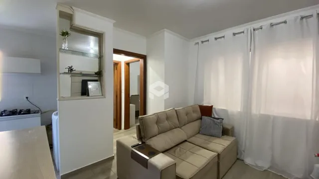 Esta é uma foto da sala de estar de um imóvel em Lajeado, Brasil.
