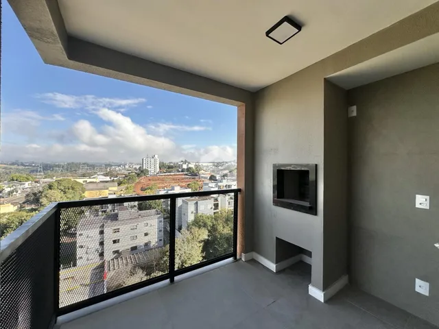 Vista da varanda com vista para a paisagem da cidade.