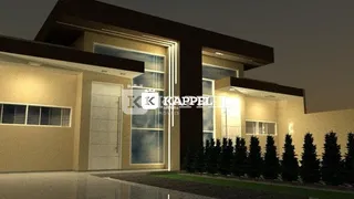 Fachada de uma residência em Lajeado, Brasil, mostrando a entrada e o paisagismo.