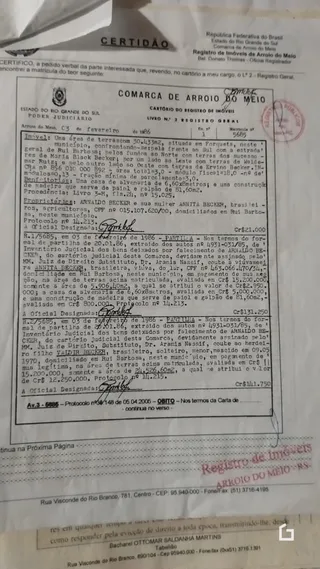 Documento oficial de registro de imóveis referente a uma propriedade no estado do Rio Grande do Sul.