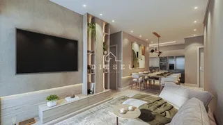 Sala de estar moderna com sofá e televisão em ambiente interno.