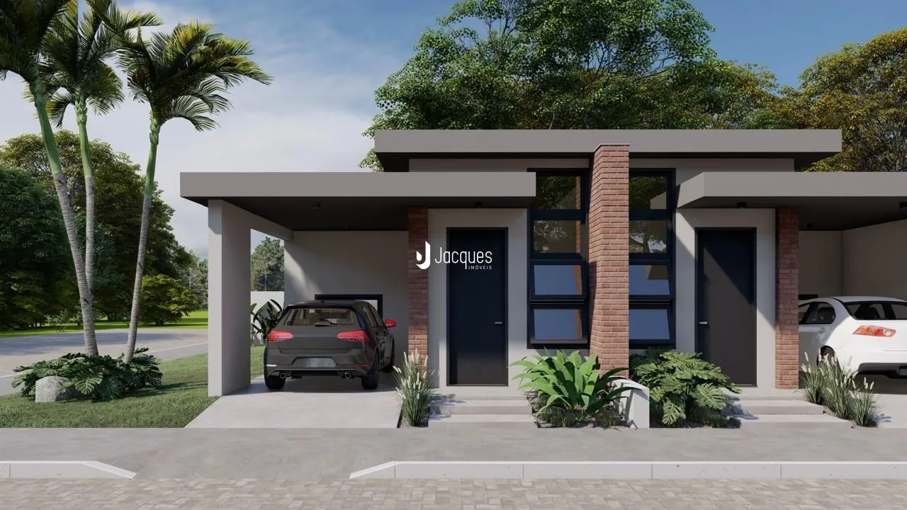 Fachada de uma residência moderna com jardim em Lajeado.