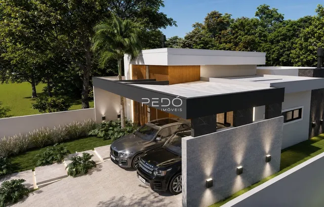 Fachada de uma residência moderna com paisagismo em Lajeado.