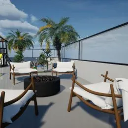 Varanda com móveis de madeira e vista para o horizonte.