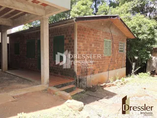 Fachada de uma casa de tijolos vermelhos em Lajeado, Brasil.