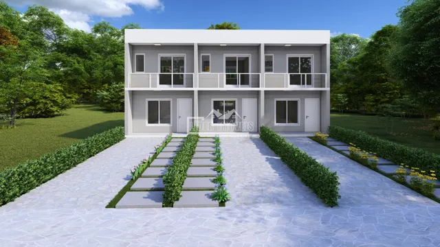 Fachada de uma casa moderna em Lajeado, Brasil, com jardim frontal.
