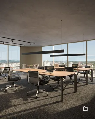 Uma sala de escritório com mesa de madeira e cadeiras modernas.