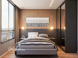 Quarto moderno com grande janela e decoração contemporânea.
