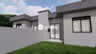 Fachada moderna de uma residência em Lajeado, Brasil, com jardim gramado.