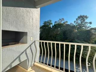Vista da varanda de um imóvel em Lajeado, Brasil, com vista para a vegetação.