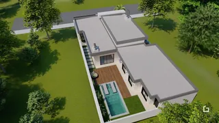 Vista aérea da fachada de uma residência com piscina em Lajeado.