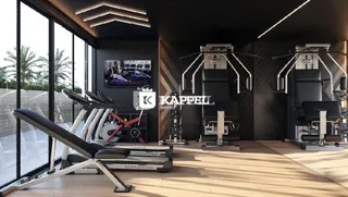 Foto de uma área de ginástica interna com esteiras e equipamentos de musculação.