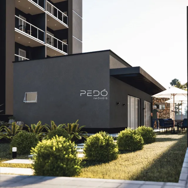 Fachada moderna de um imóvel residencial em Lajeado, Brasil, com paisagismo frontal.