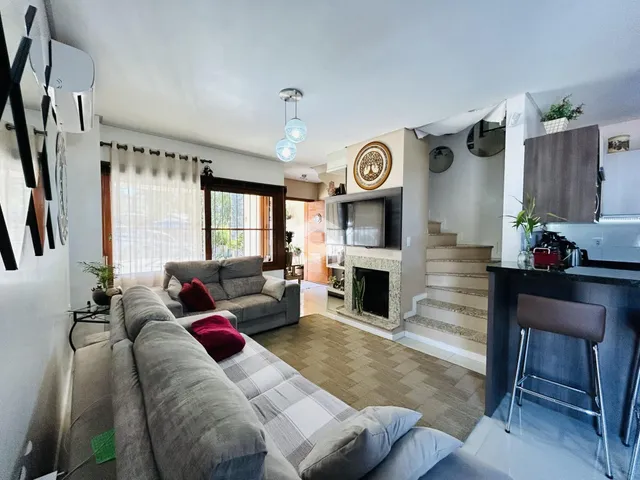 Foto da sala de estar de um imóvel em Lajeado, Brasil.