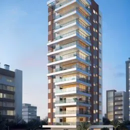 Fachada de um prédio residencial alto com vários terraços em Lajeado, Brasil.