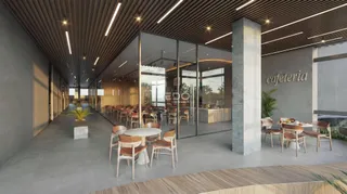 Vista de um espaço comercial moderno com paredes de vidro e piso de madeira.