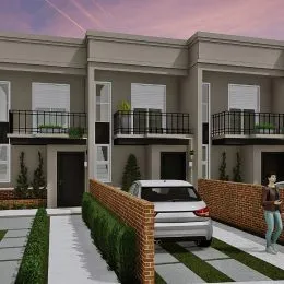 Fachada de uma residência com alvenaria de tijolos e paisagismo na entrada em Lajeado.