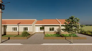 Fachada de uma casa residencial com telhado de telhas e jardim.
