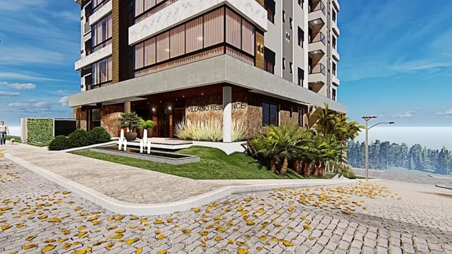 Fachada de um prédio residencial em Lajeado, Brasil com paisagismo frontal.
