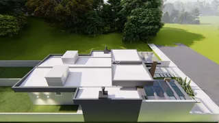 Fachada de uma residência moderna com telhado plano em Lajeado.