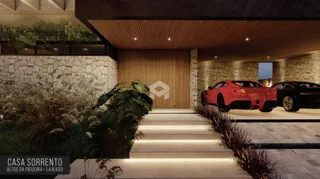 Fachada moderna de uma residência com parede de pedra e porta de madeira.