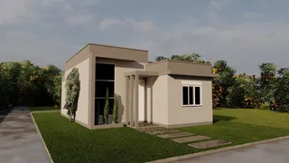 Fachada de uma casa moderna em Lajeado com jardim bem cuidado.