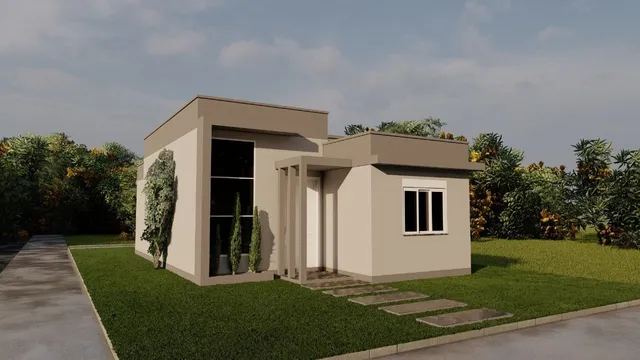 Fachada de uma casa moderna em Lajeado com jardim bem cuidado.